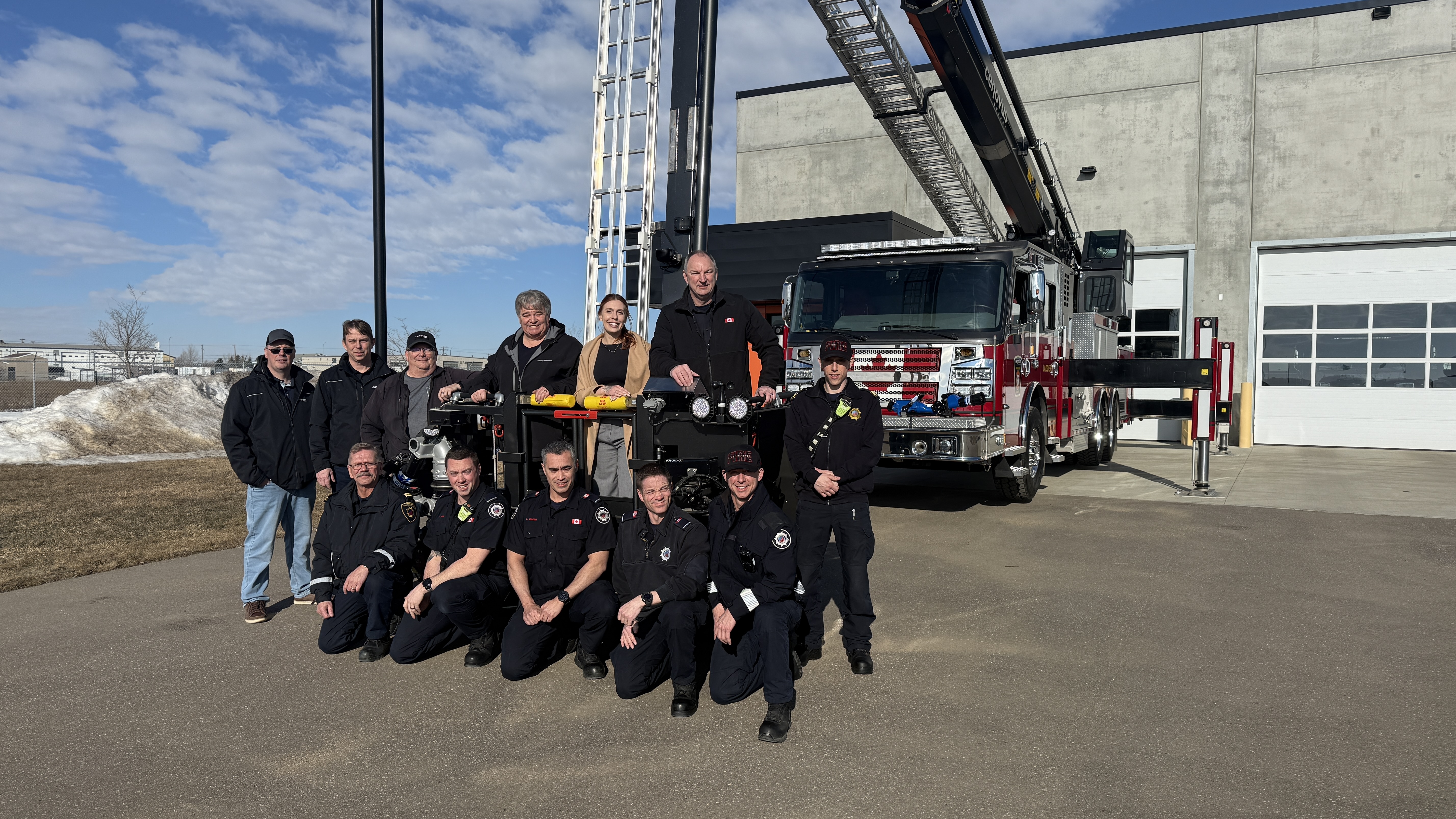 The Cenovus Emergency Management team and the Lloydminster Fire Department stand together.