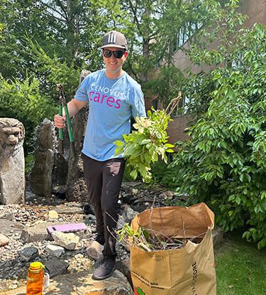 A volunteer at the Oasis Garden