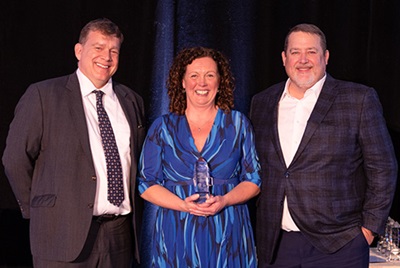 Rene Wooldridge accepts her award